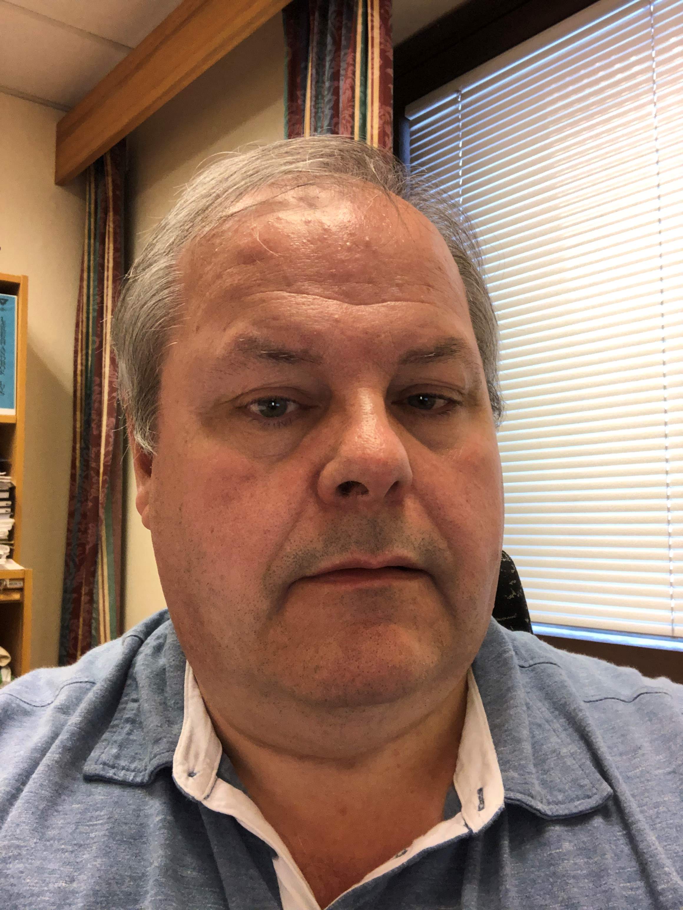 Portrettbilda av Arne M.Hansen-Krone